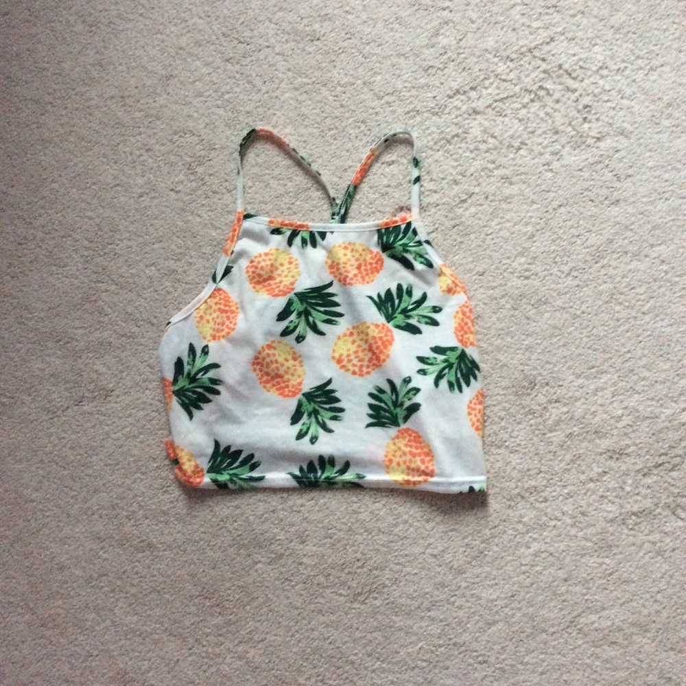 A cropped pineapple cover up